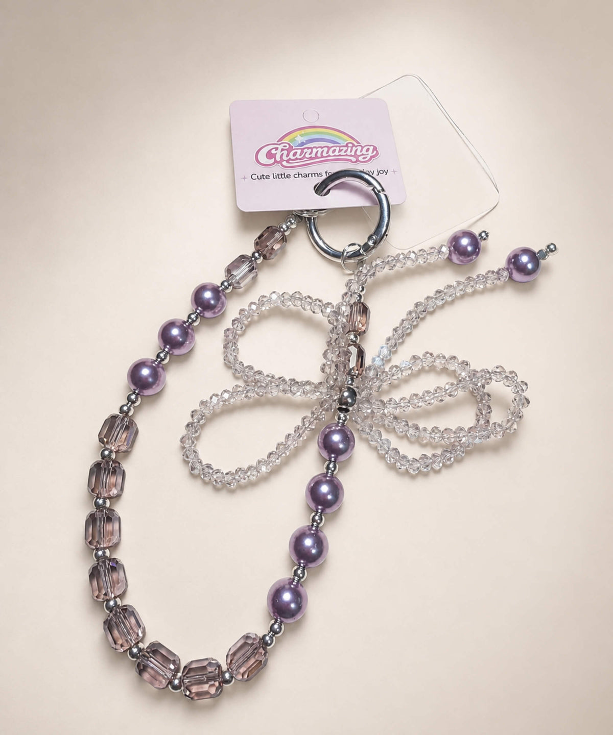 Purple ribbon bow beaded phone charm with pearl-look and crystal-style beads