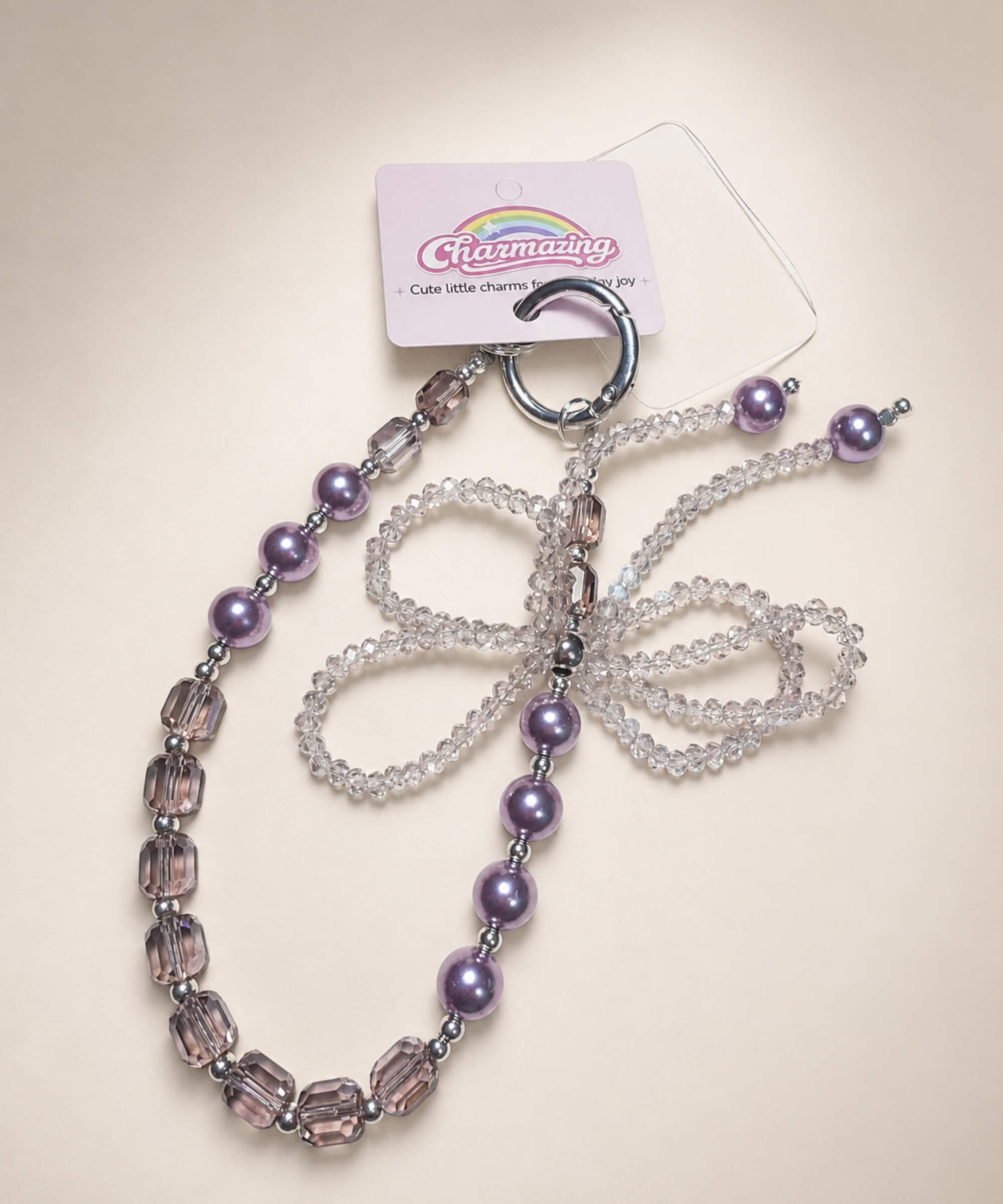 Purple ribbon bow beaded phone charm with pearl-look and crystal-style beads