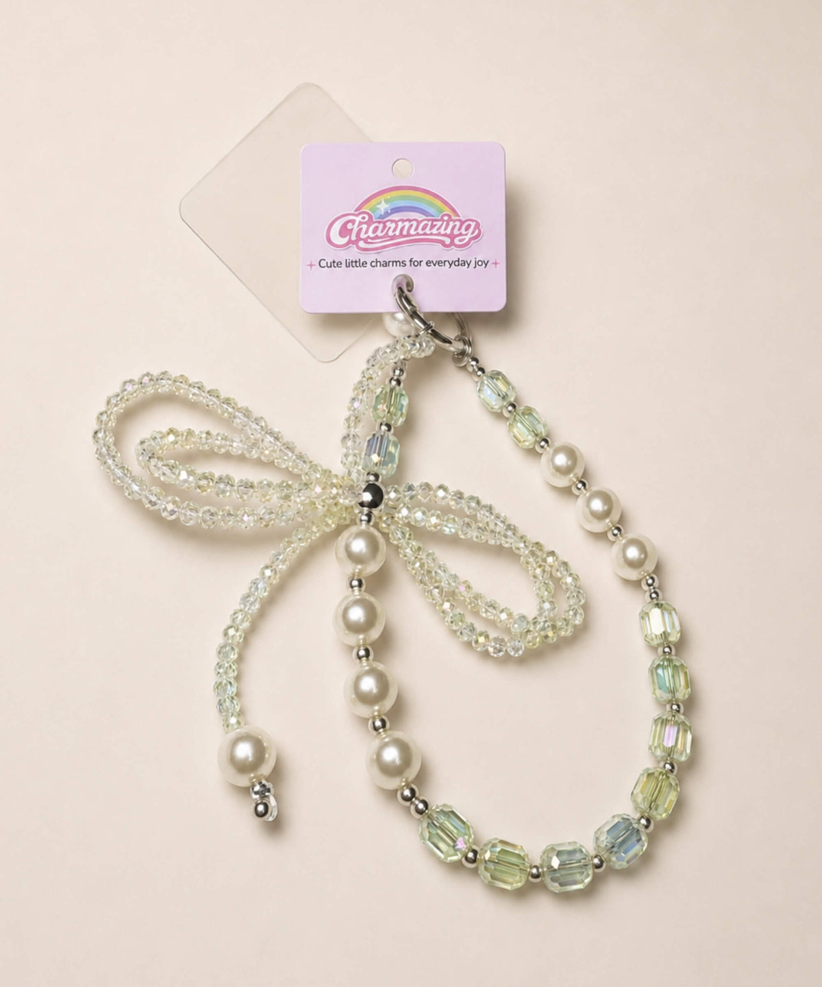 White ribbon bow beaded phone charm with pearl-look and crystal-style beads
