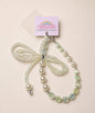 White ribbon bow beaded phone charm with pearl-look and crystal-style beads