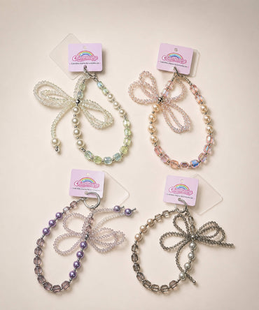 Ribbon bow beaded phone charms in white, pink, purple and grey colour styles