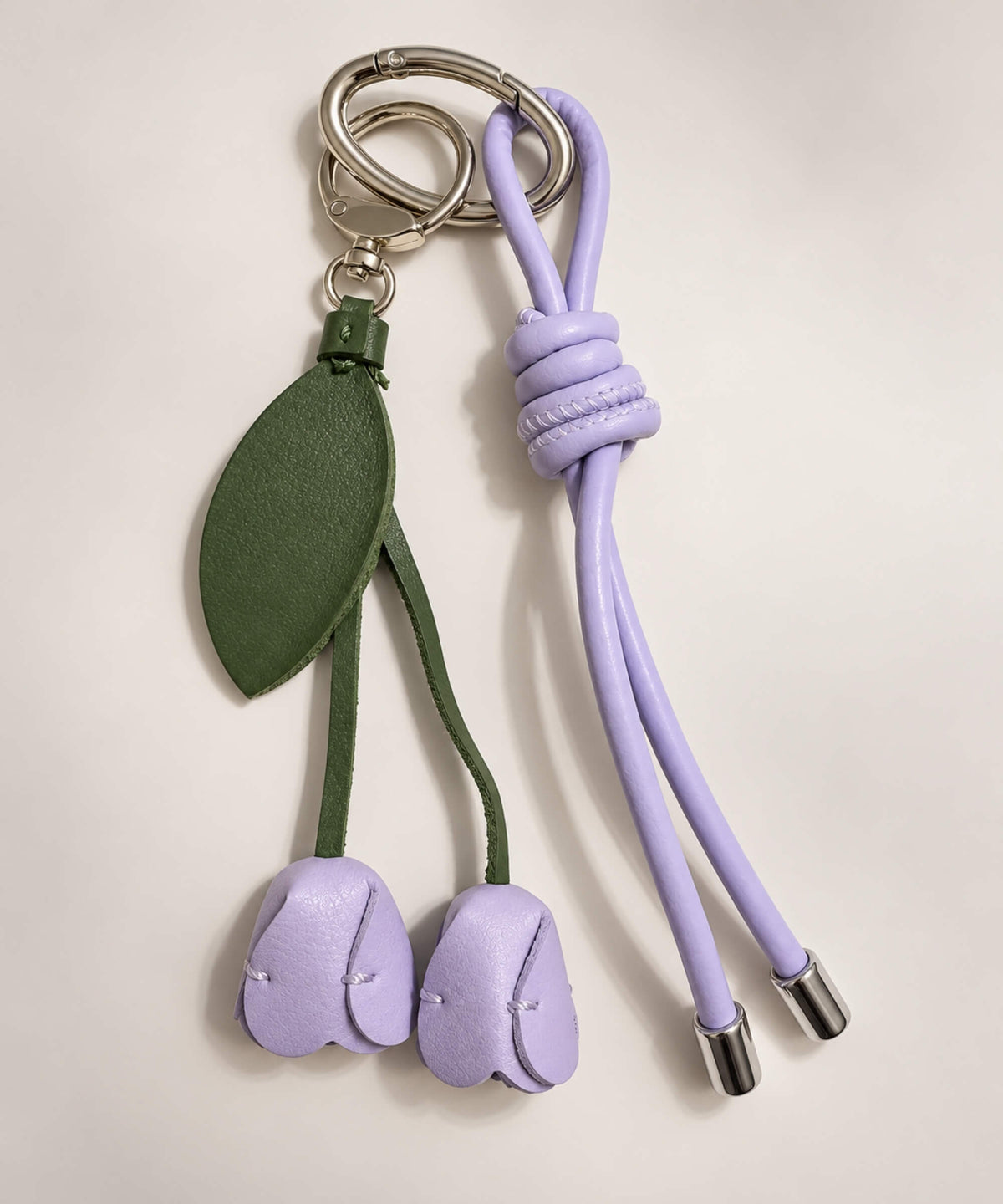 Purple rose PU leather bag charm keychain with green leaf detail
