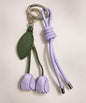 Purple rose PU leather bag charm keychain with green leaf detail