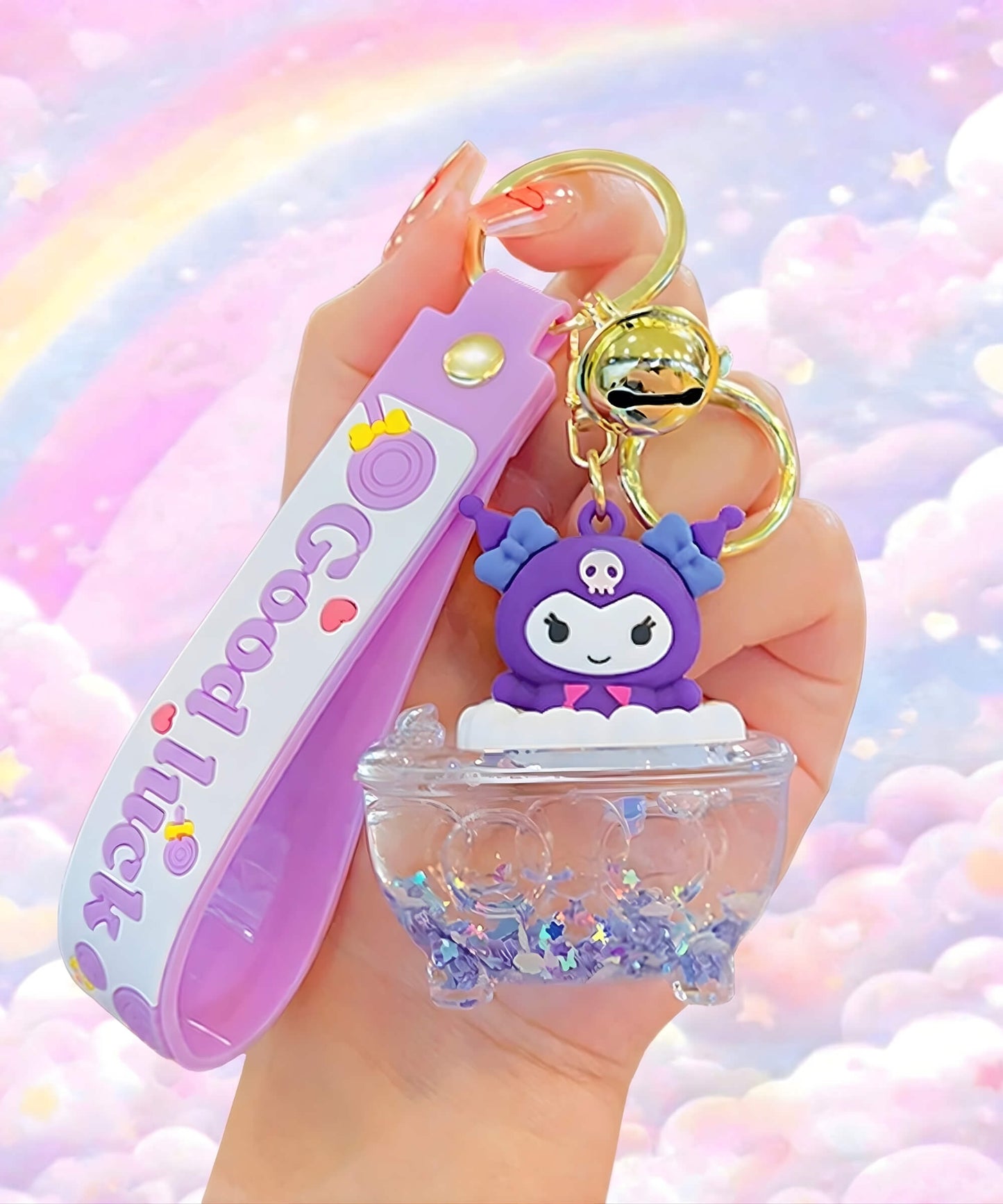 Sanrio bathtub liquid keychain with Kuromi design close up in hand, cute glitter bath shaker charm with pastel background
