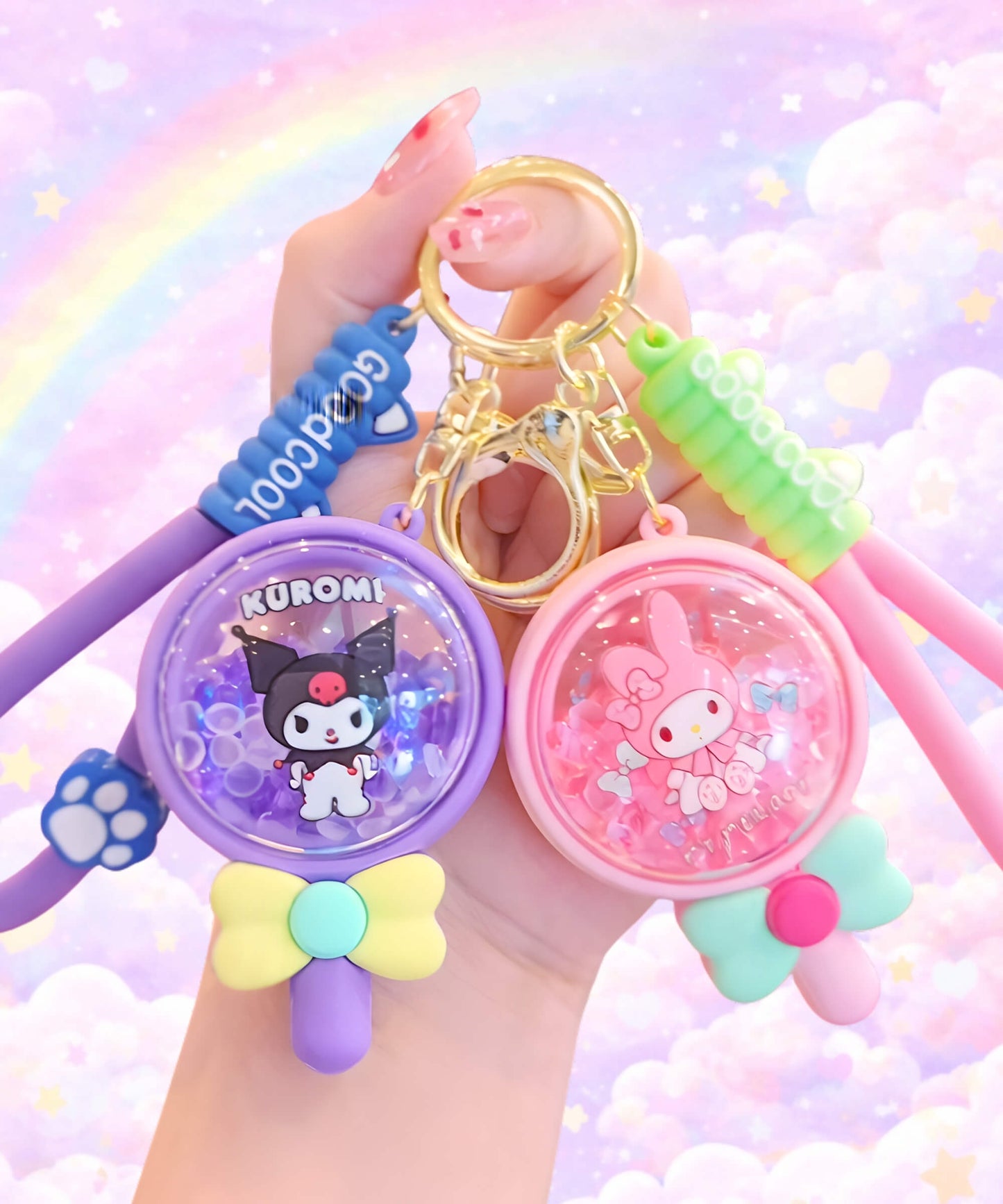 Sanrio Kuromi and My Melody bead shaker keychains in lollipop design held in hand, scented floating bead kawaii bag charms