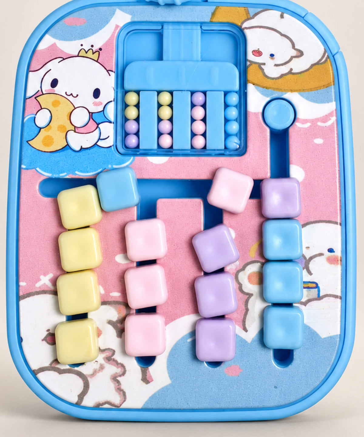 Close-up of Cinnamoroll sliding bead maze game keychain challenge beads and tracks