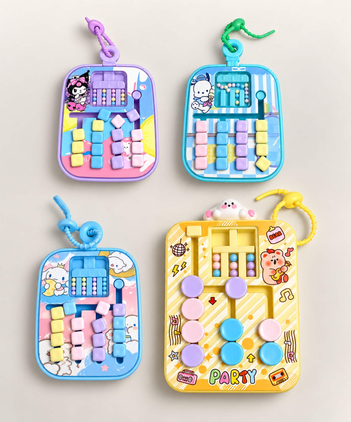 Four Sliding Bead Maze Game Keychain designs in small and large sizes