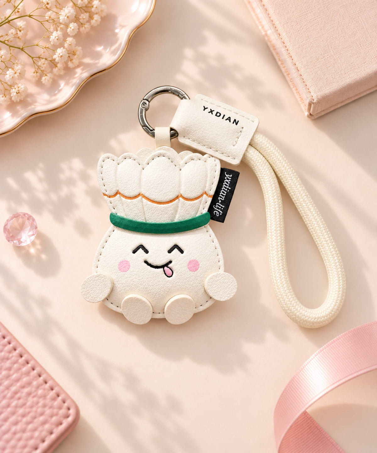 White badminton shuttlecock PU leather bag charm keychain with cream rope wrist strap