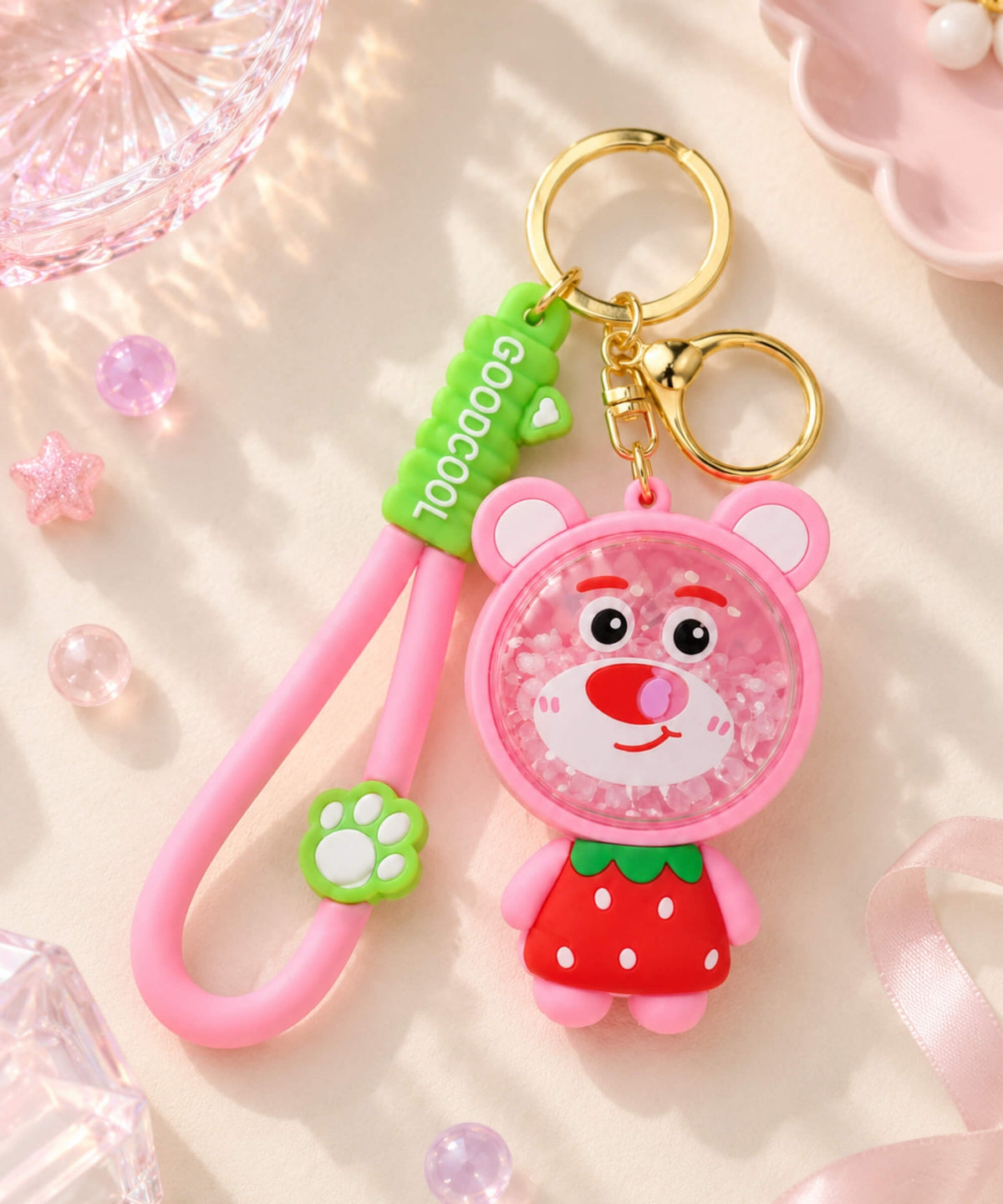 Strawberry bear bead shaker keychain with pink bear design, floating beads, strawberry outfit and pink wrist strap