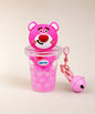Strawberry bear bubble tea liquid keychain with pink glitter beads and pink clip