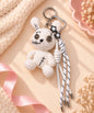 Voodoo bunny crochet keychain with button eyes and black stitched details