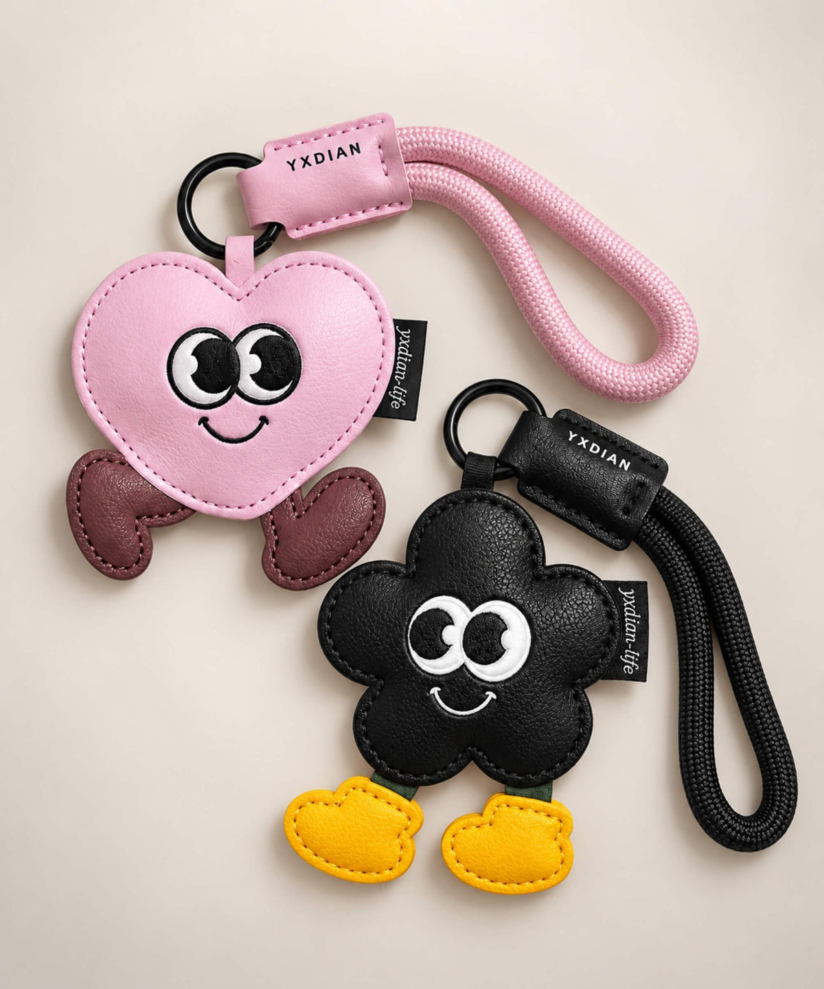 Walking Heart and Flower PU leather bag charm keychains in Pink Heart and Black Flower designs