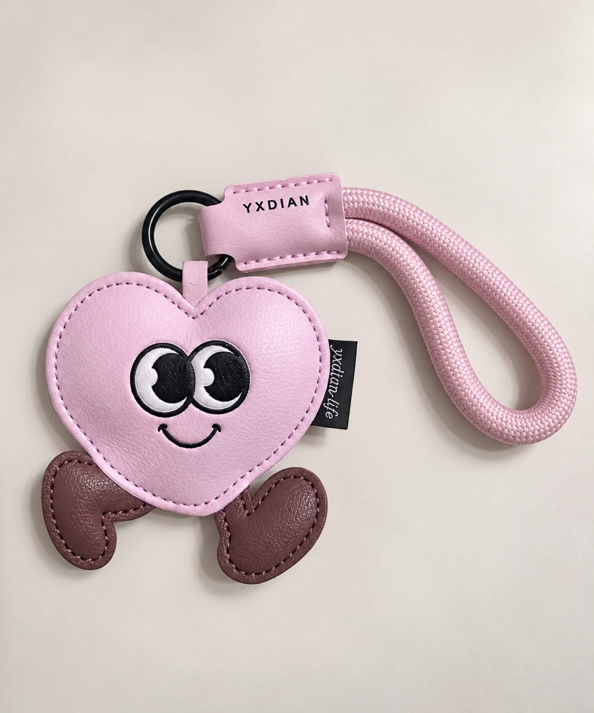 Pink Heart PU leather bag charm keychain with large cartoon eyes and brown feet
